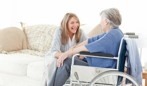 Seniors talking together in the living room