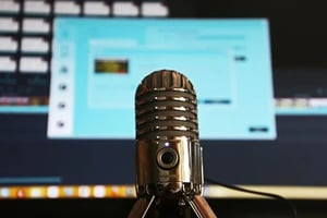 microphone in front of digital screen
