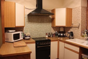kitchen with tidy cords behind appliances