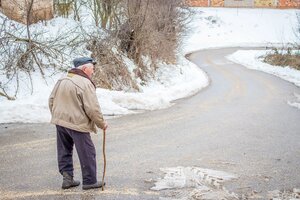 grandpa walking in the winter