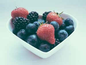 heart healthy fruits in a heart-shaped bowl