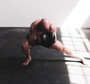 boxer practicing side lunges