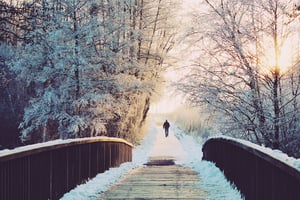 man walking in snowy winter