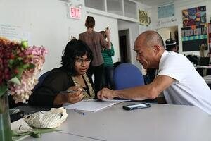 older gentleman mentoring younger studentt