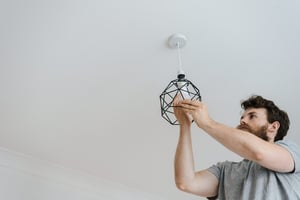 replacing ceiling light bulb