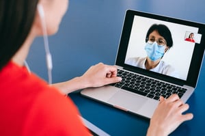 Woman speaking with doctor on video call