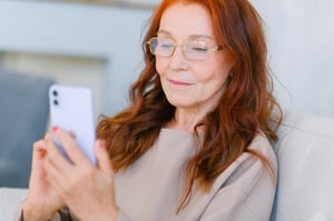 older woman using smartphone