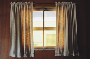 bright window with curtains to reduce glare