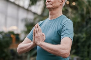 man standing up with straight back