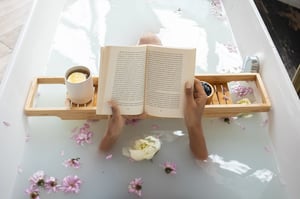 reading peacefully in evening bath