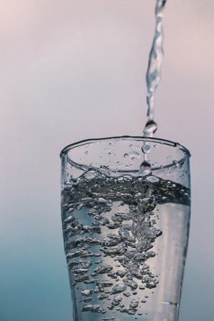 pouring glass of water