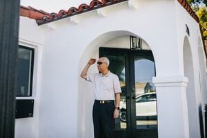 older man wearing sunglasses outside