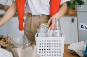 cleaning the kitchen glass bottles and food containers