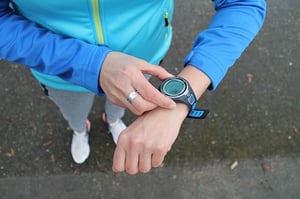 Woman wearing fitness tracker watch wearable technology