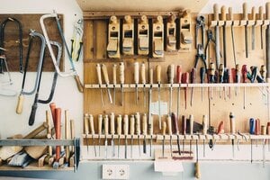 tools neatly organized on wall