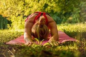 woman stretching outdoors